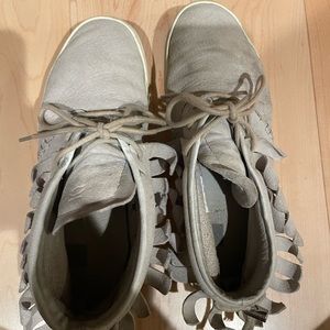 Gray leather moccasin style shoes
